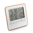 Reloj y estación meteorológica con al...
