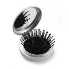 Cepillo plegable con espejo